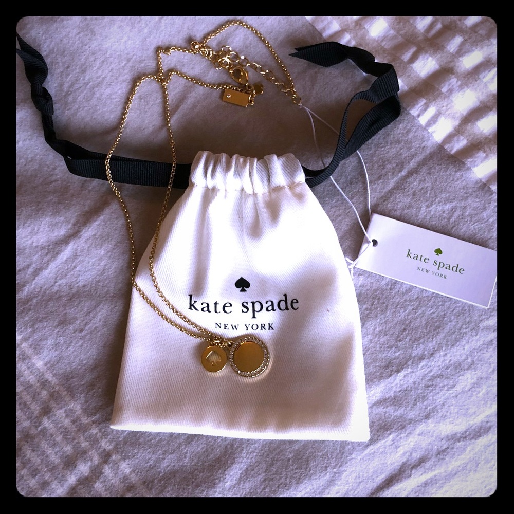 Gold chic necklace with small pendants. Kate Spade